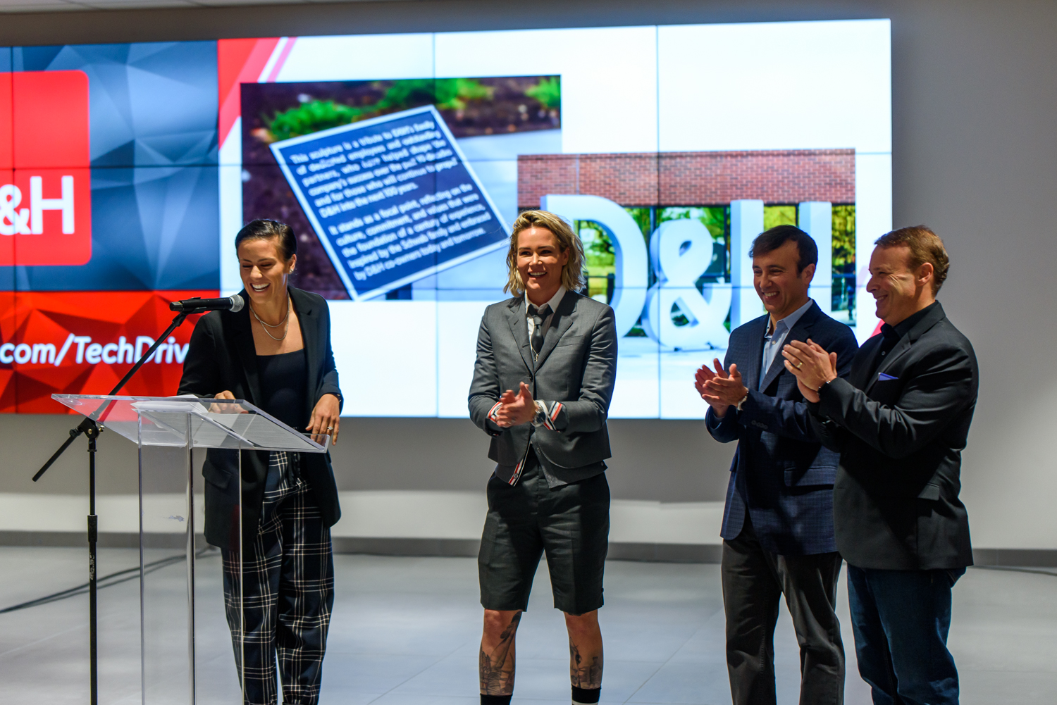 Special Guests Ali Krieger and Ashlyn Harris of the United States Women's National Soccer Team share a few words at D&H's new headquarters official opening ceremony and dedication